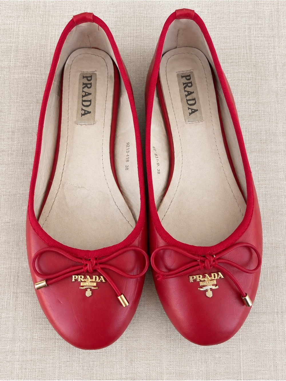 Prada Red Leather Bow Flats with Gold Logo